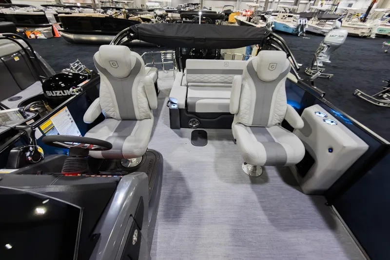 Slide: The Image of 2026 Godfrey Monaco 235 boat interior with plush seating and modern design. - 8
