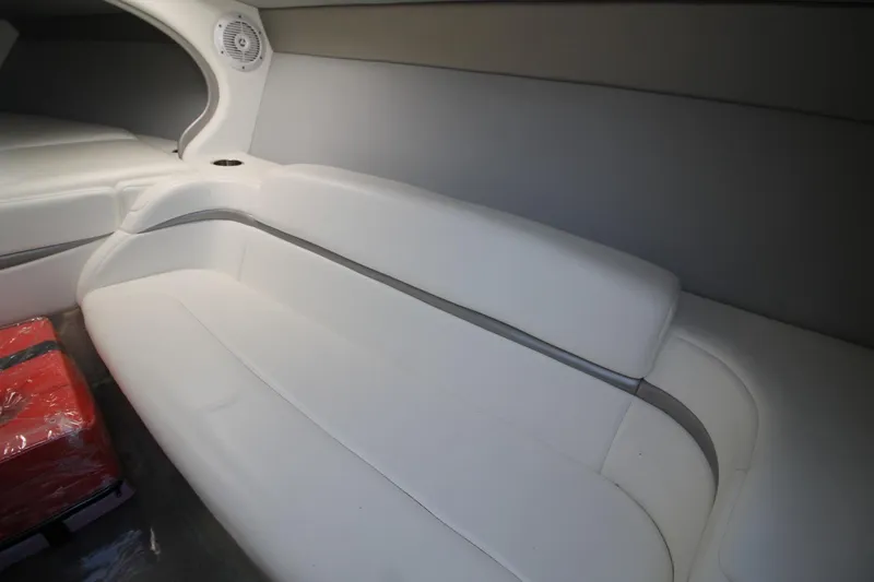 Slide: The Image of 2006 Formula 292 FASTech interior with white seating and speaker detail. - 10