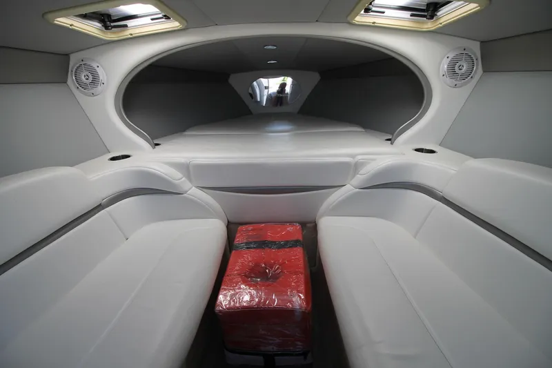 Slide: The Image of Interior of 2006 Formula 292 FASTech boat with white seating and red package. - 8