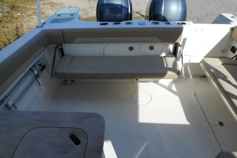Slide: The Image of 2020 Sailfish 275 DC boat interior with seating and storage compartments. - 4