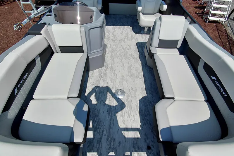 Slide: The Image of 2026 Starcraft VX 24 Q DH boat interior with spacious seating and modern design. - 15