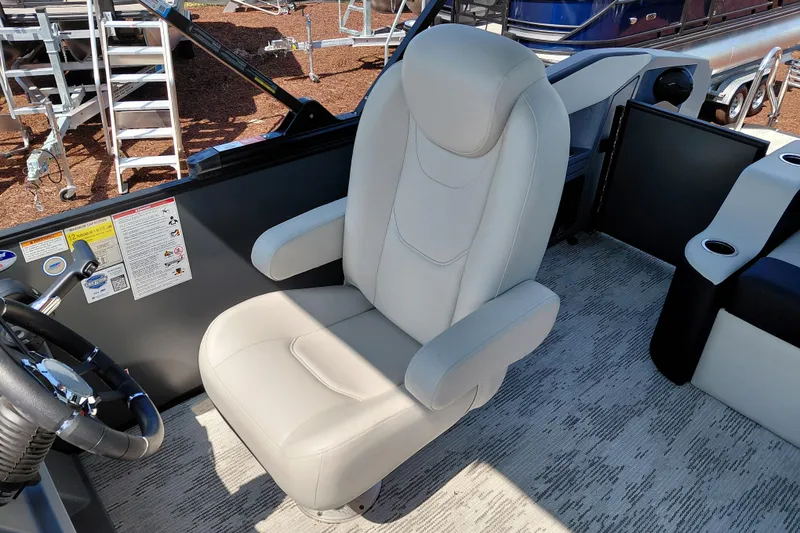 Slide: The Image of Captain's chair in 2026 Starcraft VX 24 Q DH boat, featuring sleek design and comfort. - 17
