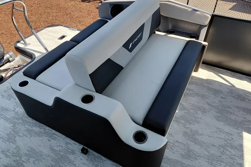 Slide: The Image of 2026 Starcraft VX 24 Q DH boat seating with cup holders and modern design. - 25