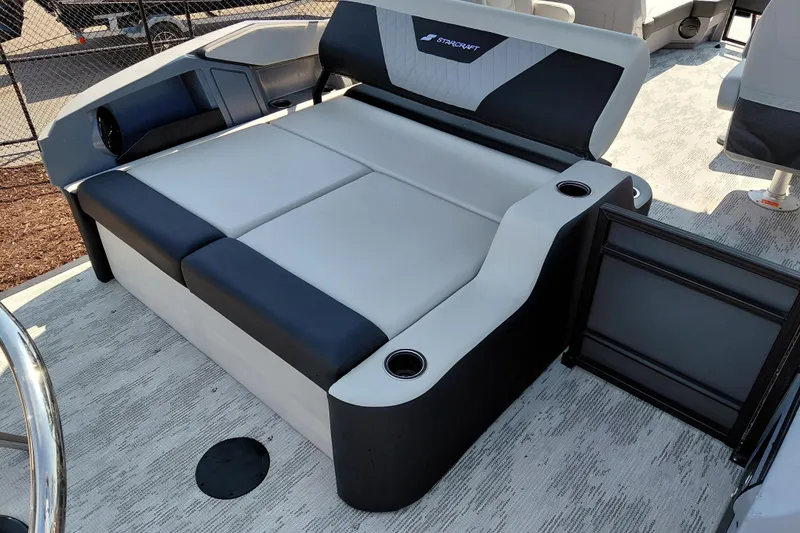 Slide: The Image of Luxurious seating on 2026 Starcraft VX 24 Q DH boat with cup holders and modern design. - 26