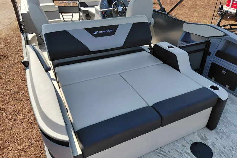 Slide: The Image of 2026 Starcraft VX 24 Q DH boat interior with comfortable seating and modern design. - 28