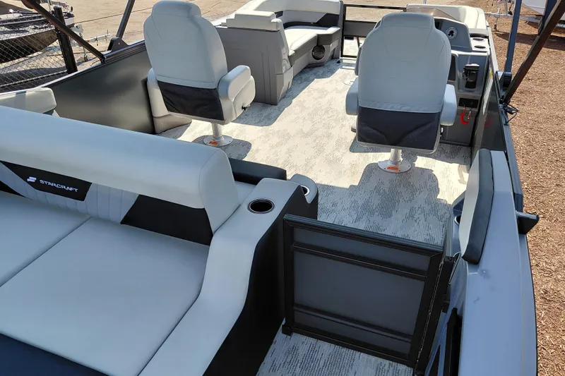 Slide: The Image of 2026 Starcraft VX 24 Q DH boat interior with modern seating and sleek design. - 35