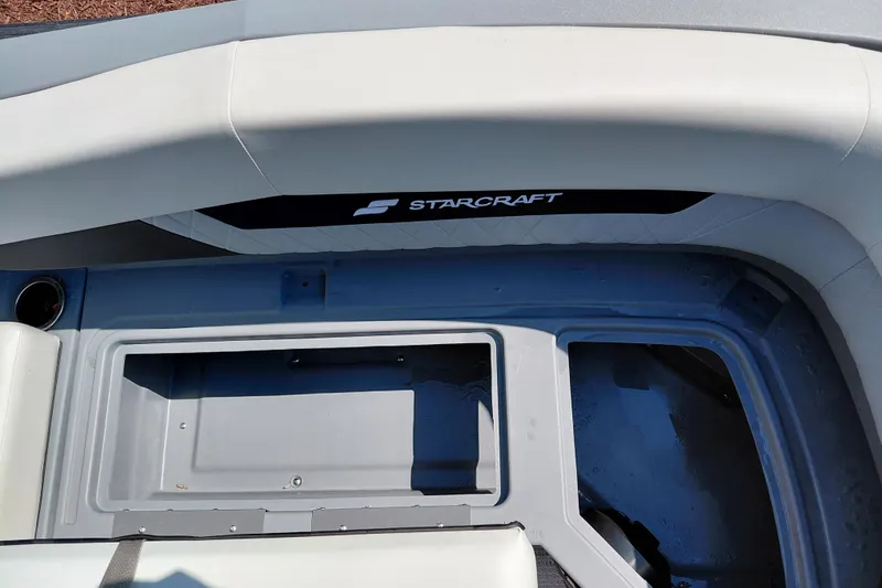 Slide: The Image of Interior of a 2026 Starcraft VX 24 Q DH boat. - 38