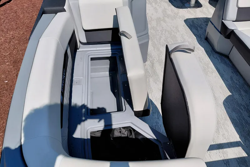 Slide: The Image of Starcraft VX 24 Q DH 2026 boat interior with open storage compartment. - 40