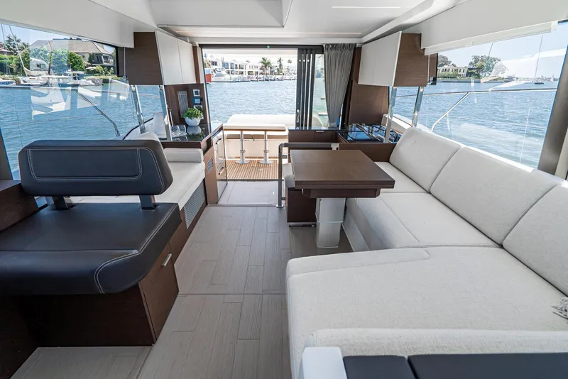 Slide: The Image of Interior of a Prestige 420 yacht, modern design, view of the water. - 11