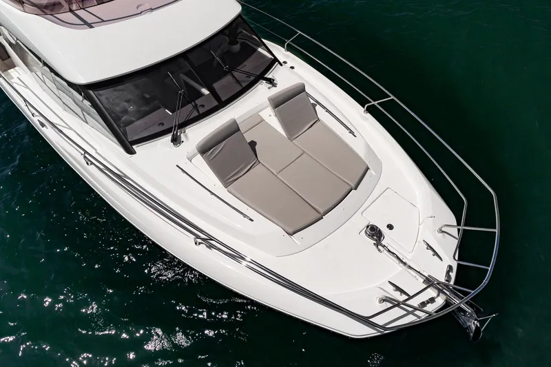 Slide: The Image of Aerial view of a 2021 Prestige 420 yacht on the water. - 2