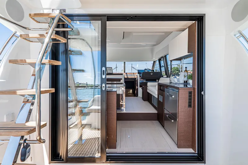 Slide: The Image of Interior of a 2021 Prestige 420 yacht with modern amenities. - 7