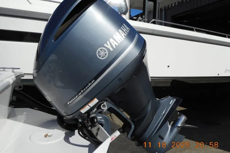 Slide: The Image of Yamaha four-stroke outboard motor on 2021 NorthCoast 235 HT boat. - 10