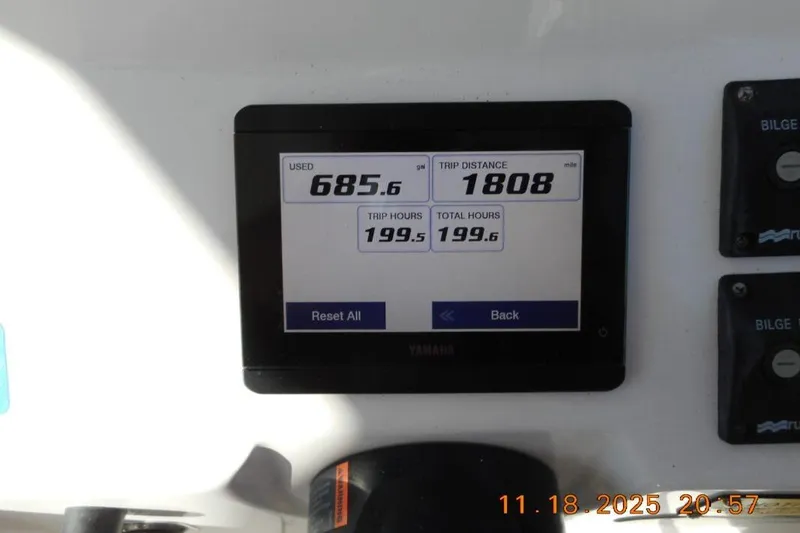 Slide: The Image of Dashboard display of a 2021 NorthCoast 235 HT boat showing trip data and bilge controls. - 9