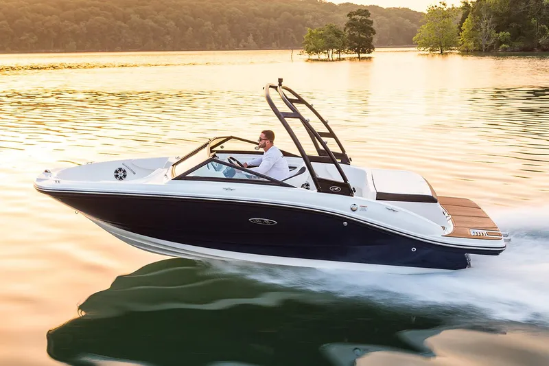 The Image of 2023 Sea Ray SPX 190 boat on trailer at marina, sunny day. - 0