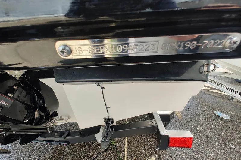 Slide: The Image of 2023 Sea Ray SPX 190 boat hull identification plate and trailer detail. - 25