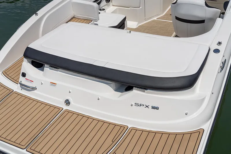 Slide: The Image of 2023 Sea Ray SPX 190 boat on trailer at marina, covered and ready for transport. - 7