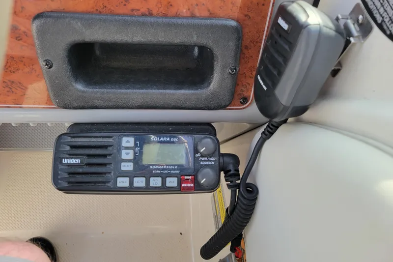 Slide: The Image of Uniden Solara DSC radio on 2007 Bayliner 245 Cruiser dashboard. - 15