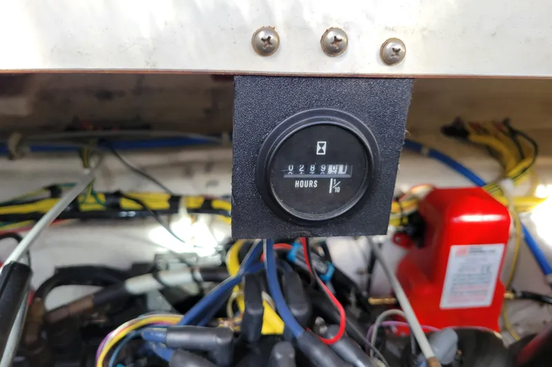 Slide: The Image of Hour meter display on 2007 Bayliner 245 Cruiser boat engine compartment. - 21