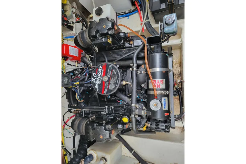 Slide: The Image of Engine compartment of a 2007 Bayliner 245 Cruiser with Mercury 5.0L engine. - 34