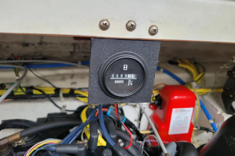 Slide: The Image of Hour meter display in a 2007 Bayliner 245 Cruiser engine compartment. - 35