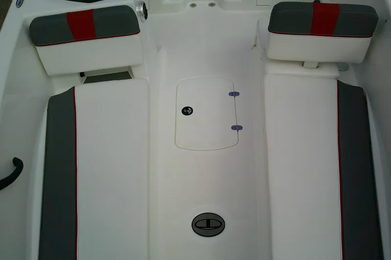 Slide: The Image of 2024 Tahoe T18 boat interior with white and gray seating, featuring red accents. - 11