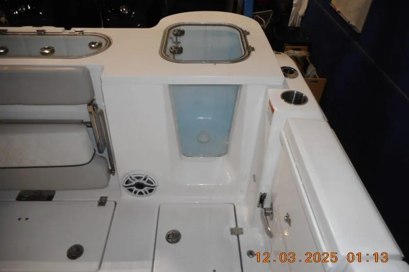 Slide: The Image of 2023 Sea Fox 288 Commander boat interior with seating and storage compartments. - 14