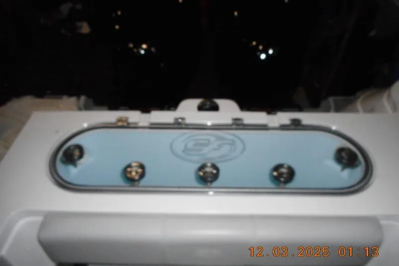 Slide: The Image of 2023 Sea Fox 288 Commander boat livewell with multiple latches, photographed at night. - 15