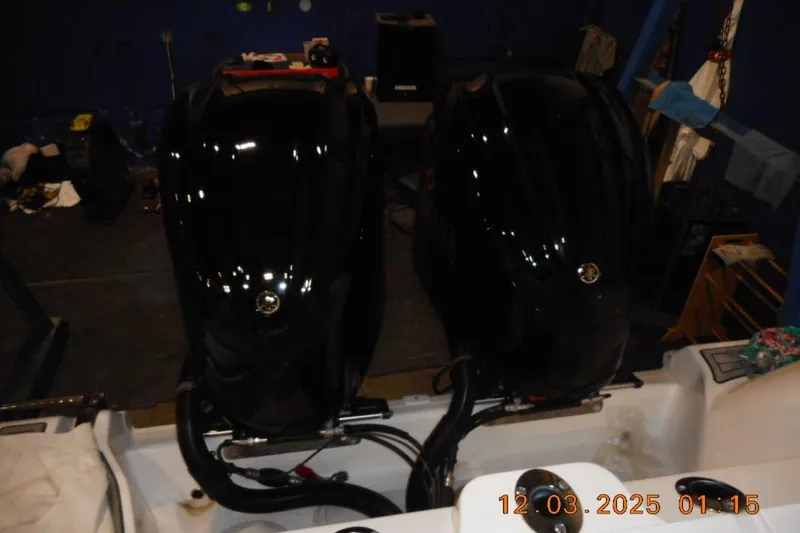 Slide: The Image of Twin black outboard engines on a 2023 Sea Fox 288 Commander boat. - 19