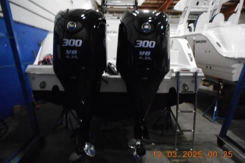 Slide: The Image of Twin Yamaha 300 V6 outboard engines on a 2023 Sea Fox 288 Commander boat. - 3