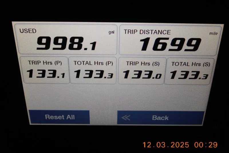Slide: The Image of Display screen showing Sea Fox 288 Commander trip data: 998.1 gallons used, 1699 miles traveled. - 9