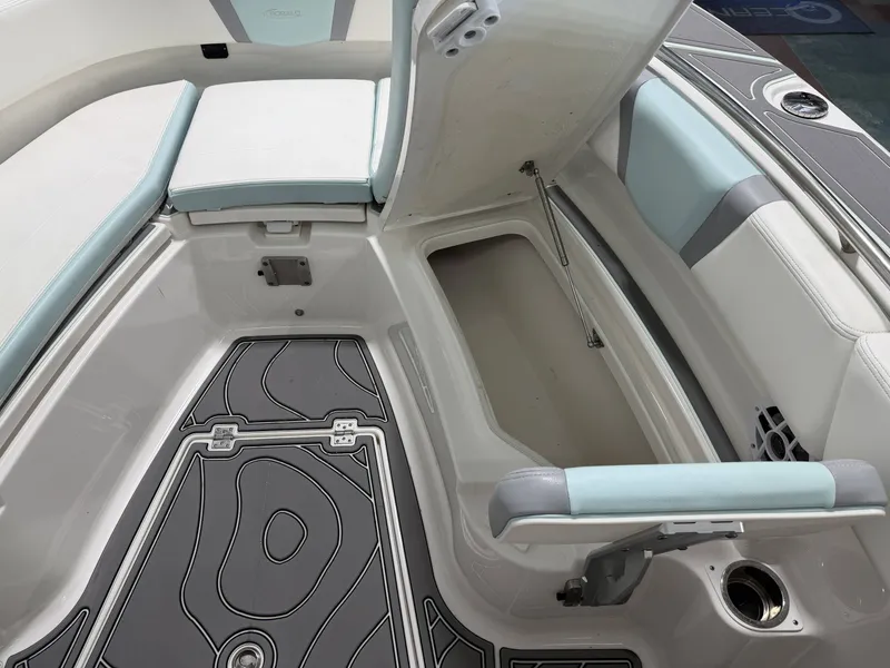 Slide: The Image of Interior view of 2023 Robalo R250 Center Console with storage compartment. - 32