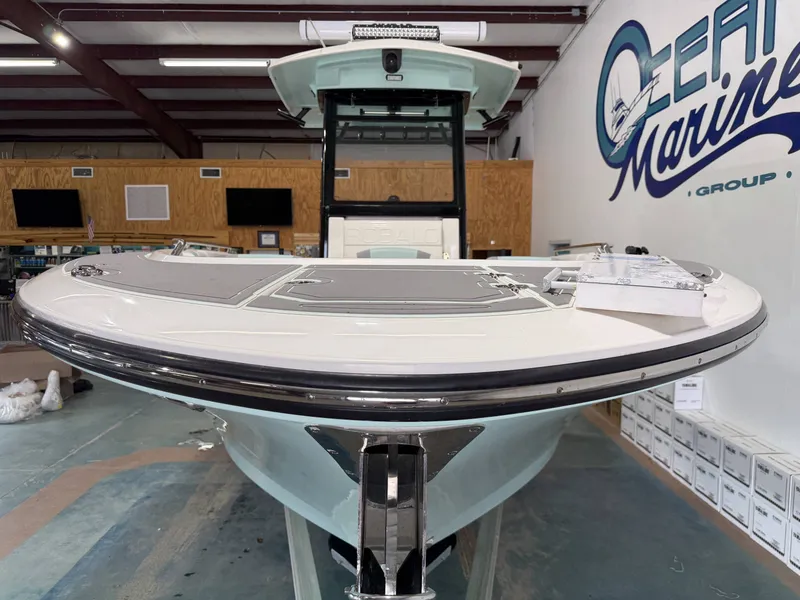 Slide: The Image of 2023 Robalo R250 Center Console boat in showroom. - 34