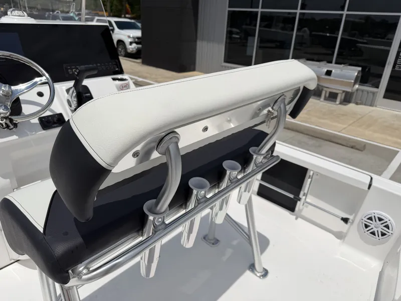 Slide: The Image of Rear view of 2026 Tidewater 2110BMT boat with bench seat and rod holders. - 15