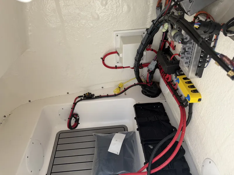 Slide: The Image of Interior view of 2026 Tidewater 2110BMT boat electrical system. - 16