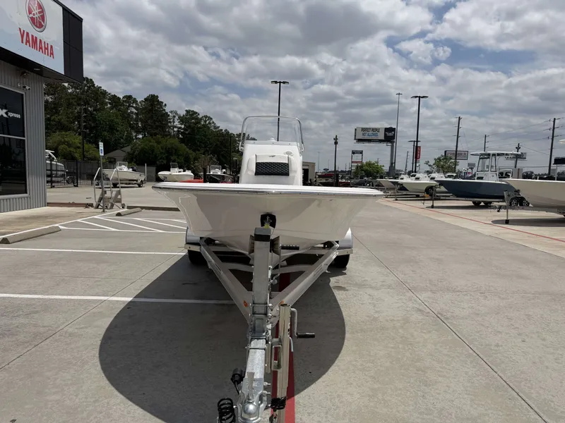 Slide: The Image of 2026 Tidewater 2110BMT boat on trailer outside Yamaha store. - 28