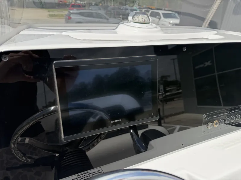 Slide: The Image of Dashboard of Tidewater 2110BMT 2026 with Garmin display and compass. - 7