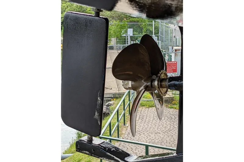 Slide: The Image of Propeller and rudder of 2005 American Tug 41, dockside view. - 10