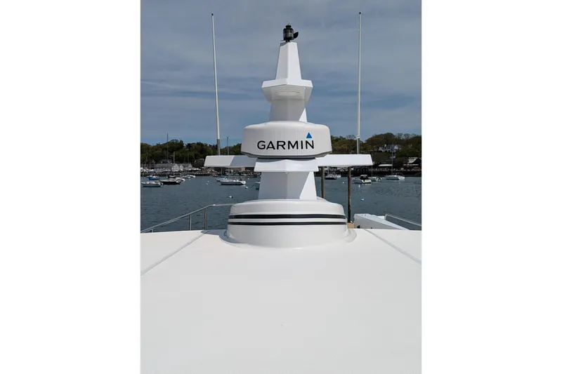 Slide: The Image of Rooftop view of 2005 American Tug 41 with Garmin radar, overlooking marina. - 16