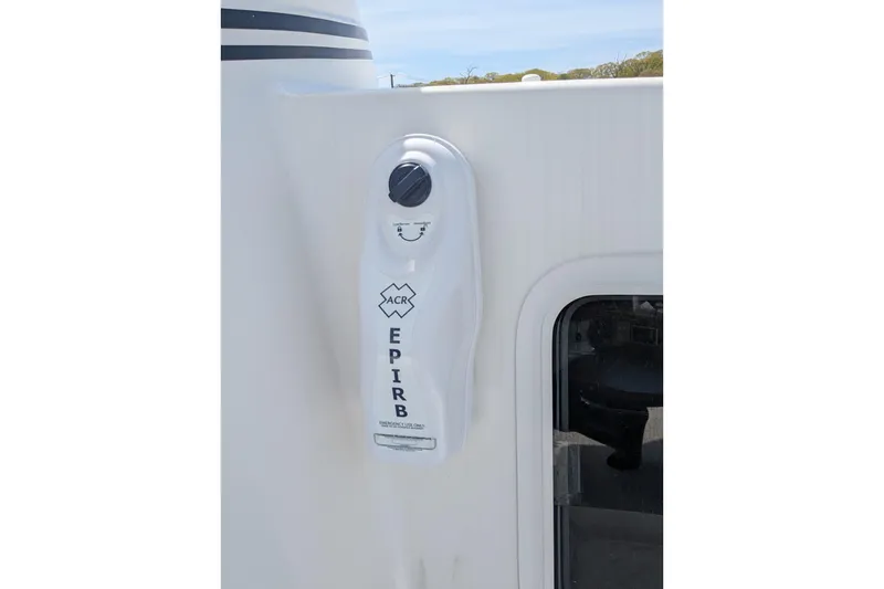 Slide: The Image of EPIRB device mounted on 2005 American Tug 41 boat exterior. - 17