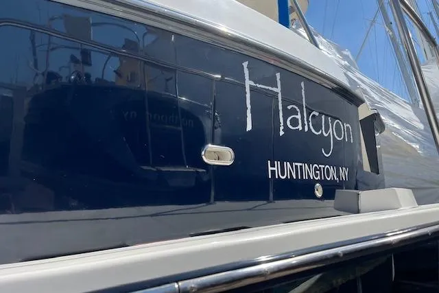 Slide: The Image of 2005 American Tug 41 boat named "Halcyon" docked in Huntington, NY. - 3