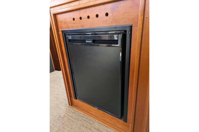 Slide: The Image of Built-in Dometic refrigerator in 2005 American Tug 41 boat interior. - 40
