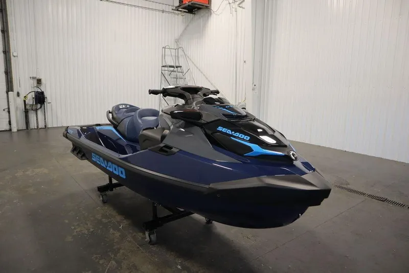 Slide: The Image of 2026 Sea-Doo GTX 170 jet ski in a showroom, featuring sleek blue design. - 3
