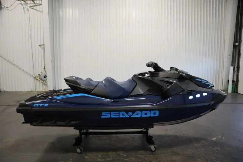 Slide: The Image of 2026 Sea-Doo GTX 170 jet ski in a showroom, side view. - 4