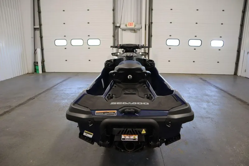Slide: The Image of 2026 Sea-Doo GTX 170 jet ski in a garage, rear view. - 6