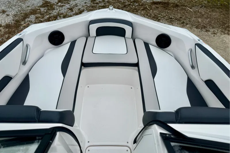 Slide: The Image of 2025 Yamaha Boats AR195 interior with sleek seating and modern design. - 16