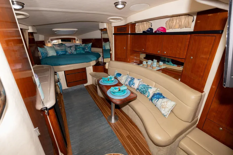 Slide: The Image of Luxurious interior of 2007 Sea Ray 340 Sundancer yacht with elegant seating and decor. - 30
