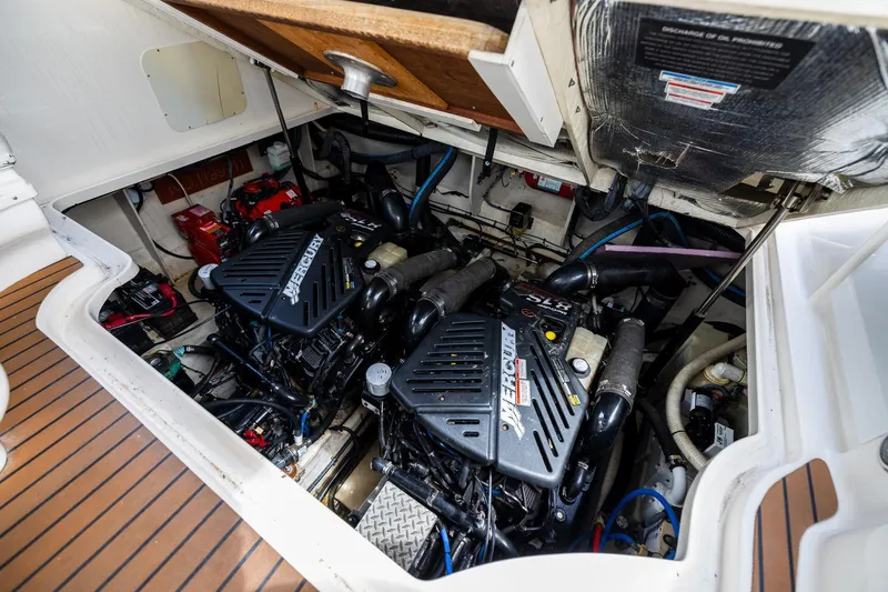 Slide: The Image of Engine compartment of a 2007 Sea Ray 340 Sundancer with twin Mercury engines. - 38
