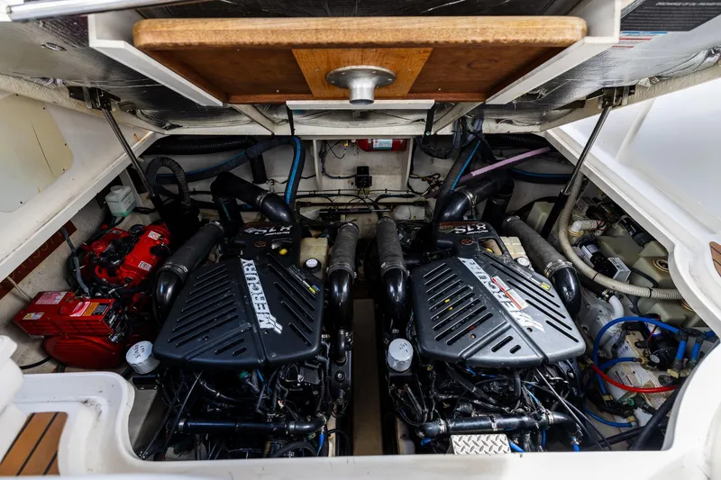 Slide: The Image of Engine compartment of a 2007 Sea Ray 340 Sundancer with twin Mercury engines. - 39