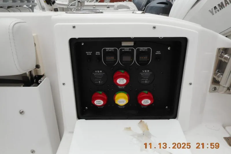 Slide: The Image of Control panel on a 2025 Sea Fox 288 Traveler boat, featuring battery switches and indicators. - 12