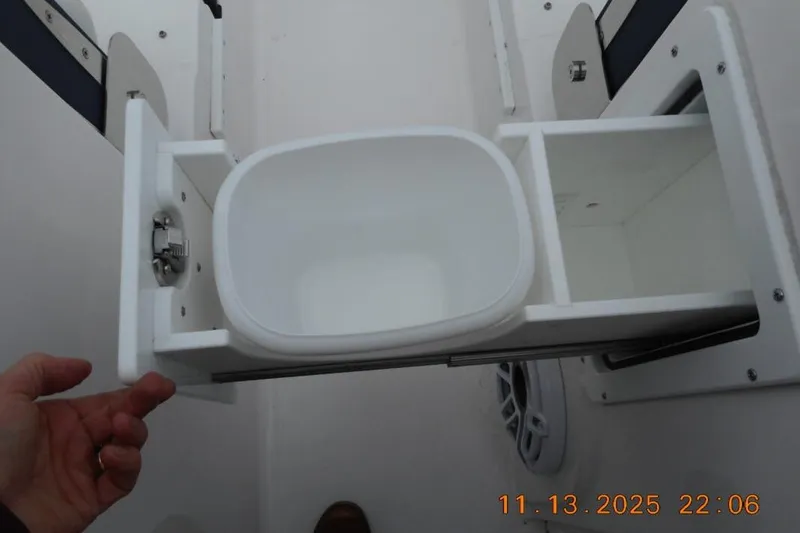 Slide: The Image of Pull-out storage compartment on a 2025 Sea Fox 288 Traveler boat. - 17